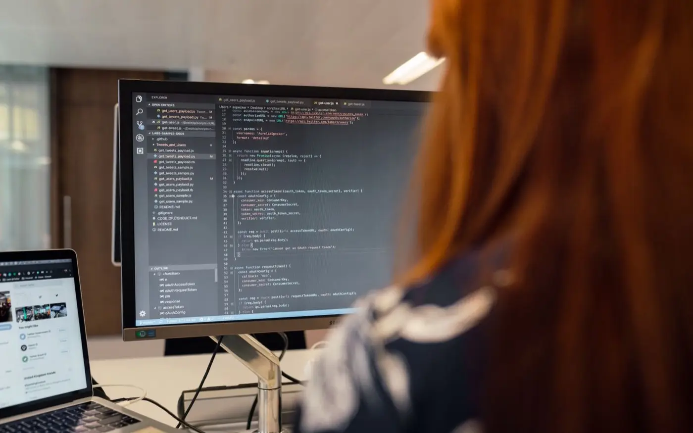 A developer working at a screen of code