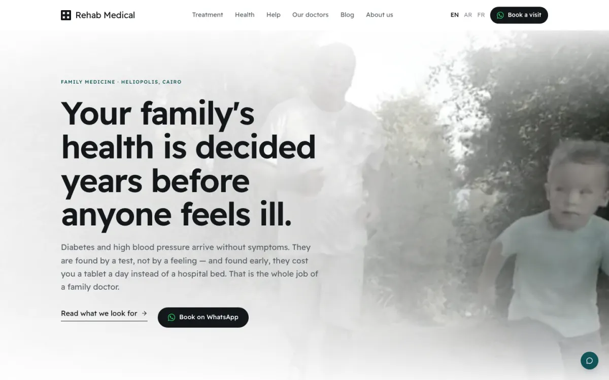 Rehab Medical home page, a family medicine practice with WhatsApp booking in three languages.